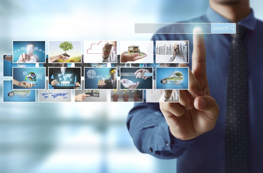 man choosing files in the computer