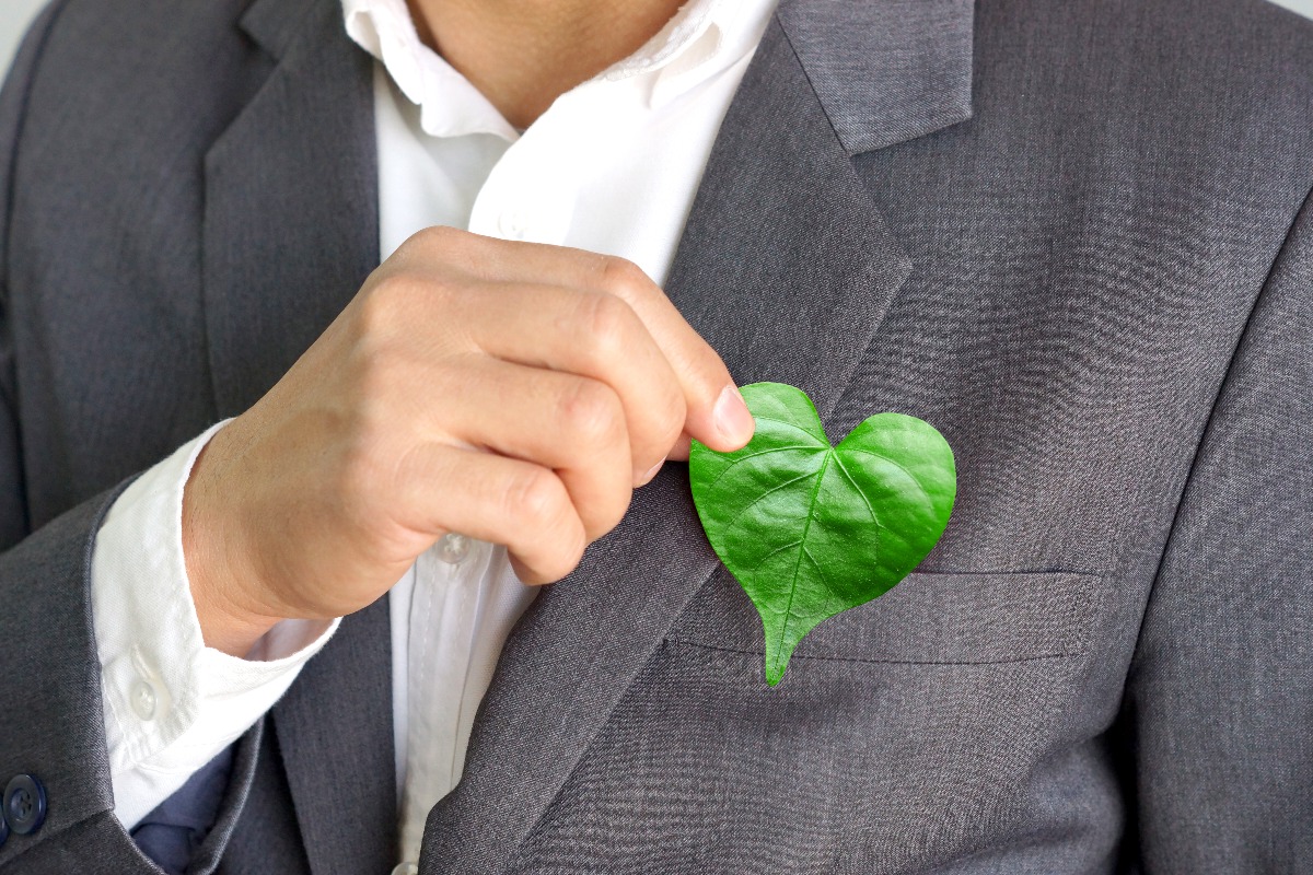 man holding a leaf