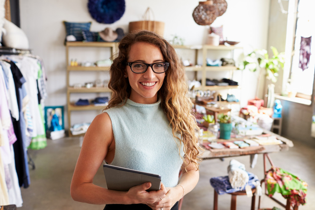 woman holding tablet