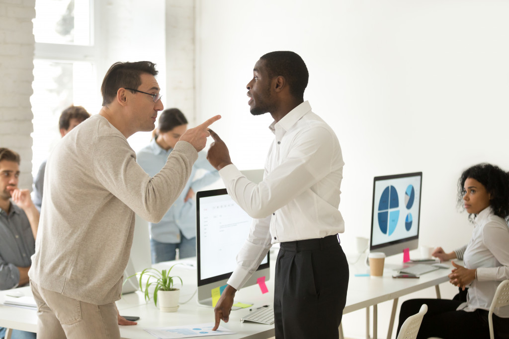 Two employees arguing