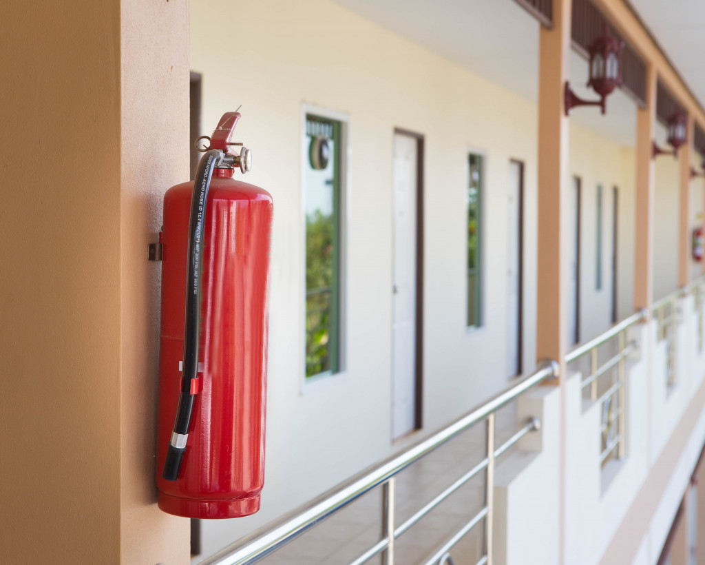 A fire extinguisher on a wall