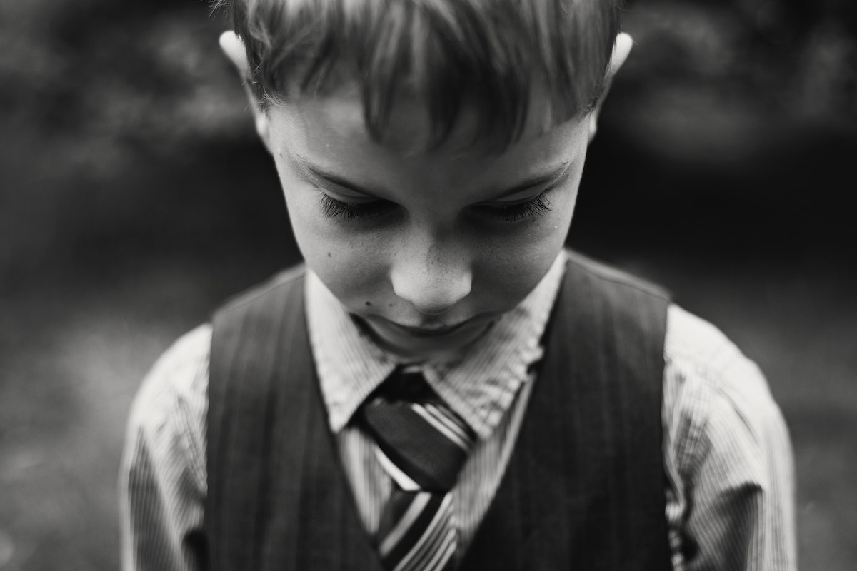 Monochrome Photo of a Sad Boy