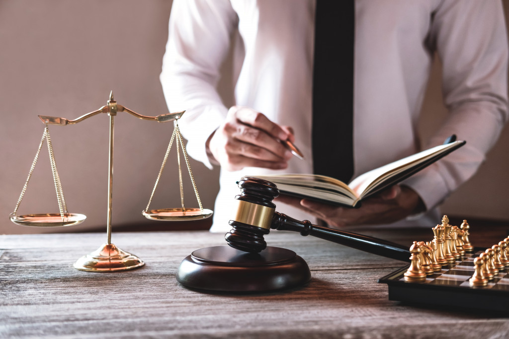 A gavel and scale on a lawyer's table