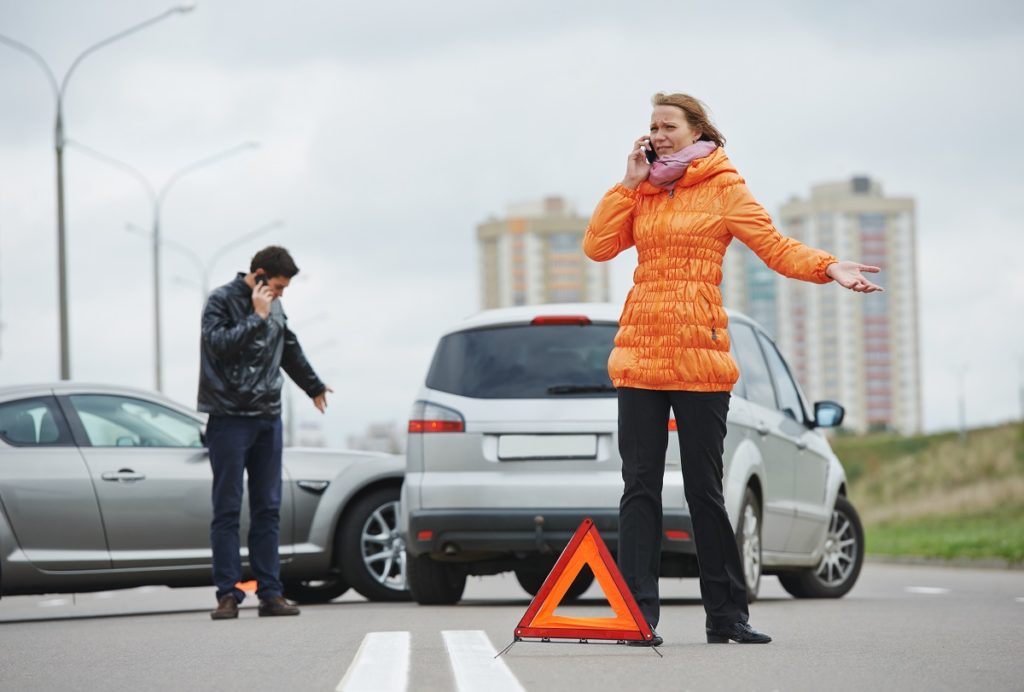 People calling someone after an accident
