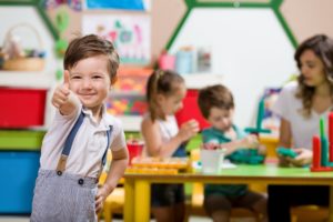 kid giving thumbs up