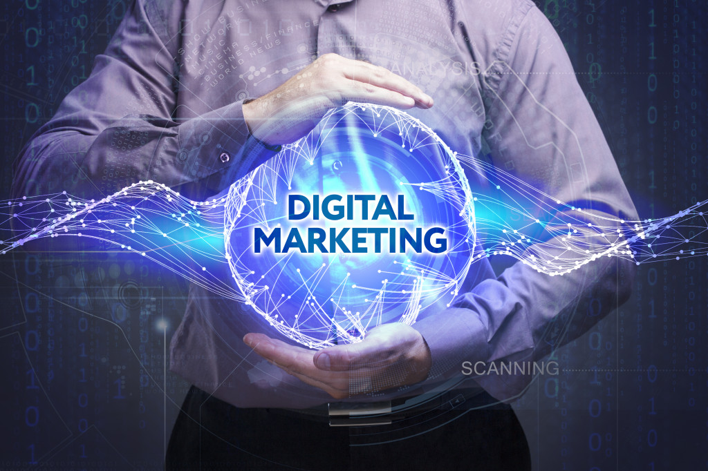 man holding blue digital marketing hologram
