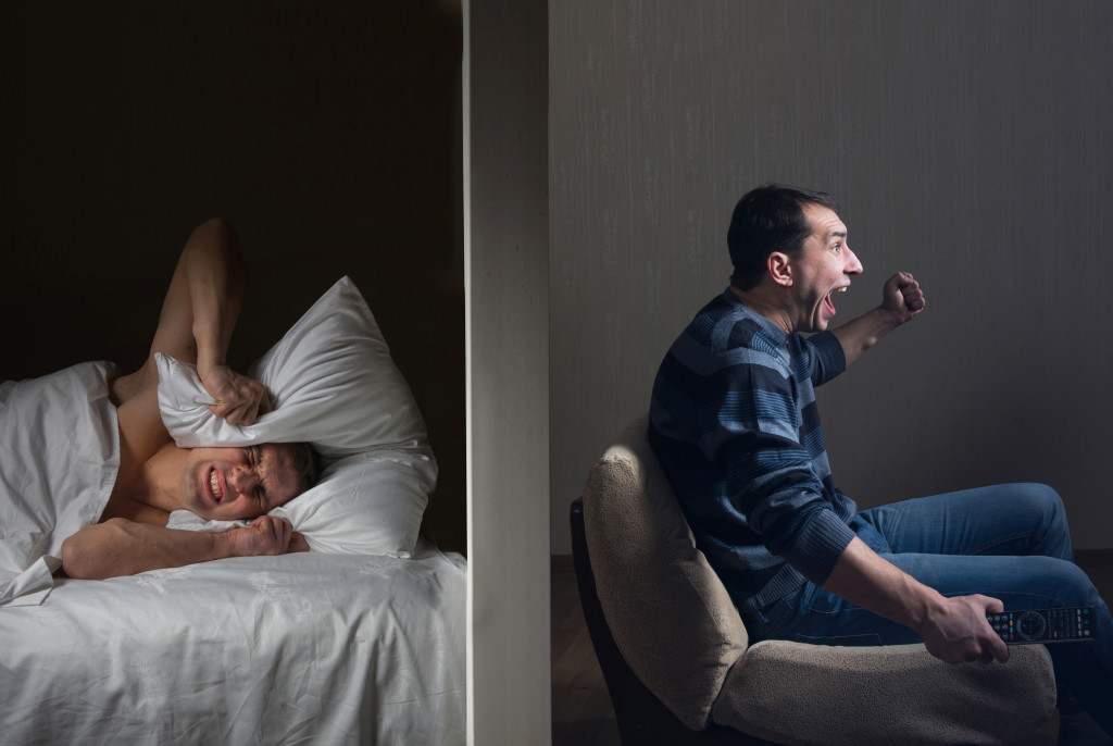 a man can't fall asleep because of noisy neighbor