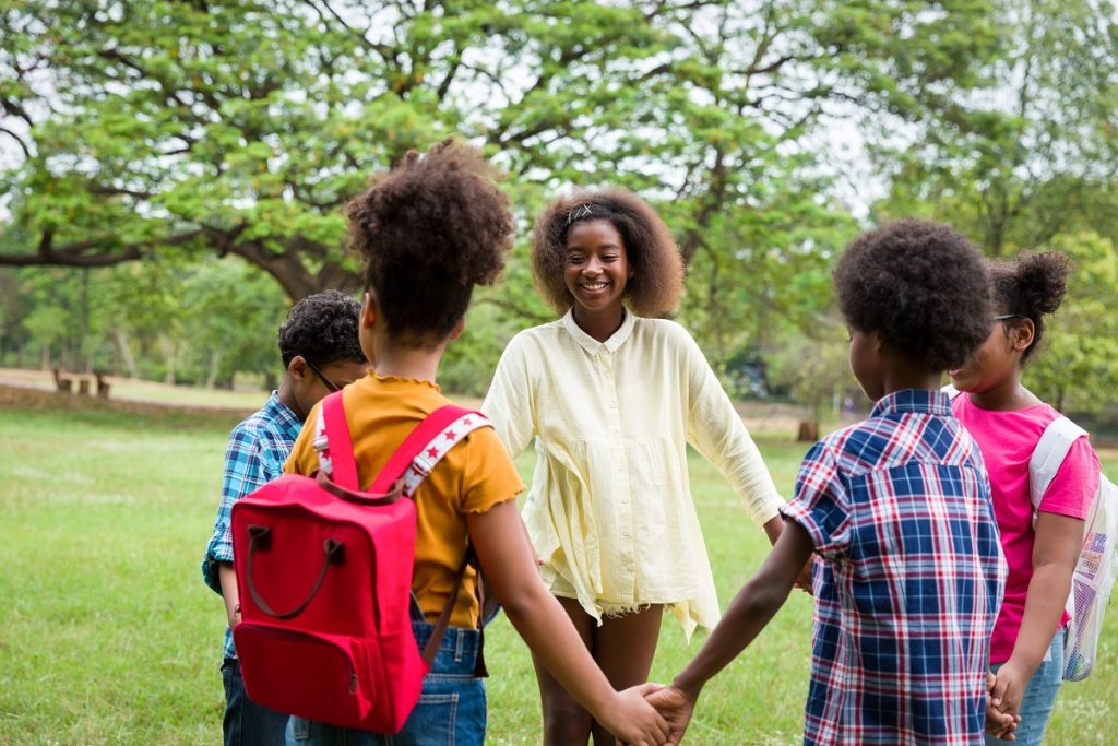 happy children joining their hands